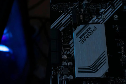 A computer motherboard is displayed with light.